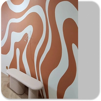 Modern interior with abstract wall art and dining area.